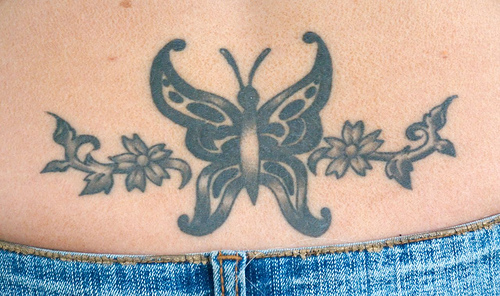 lower back tattoo pictures. lower back tattoos stars.