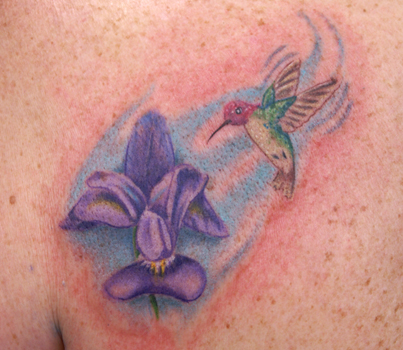 tattoo of a hummingbird tattoo of a dragon