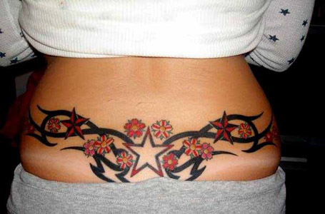 While the star tattoo is a favorite for the lower back, a shooting star 