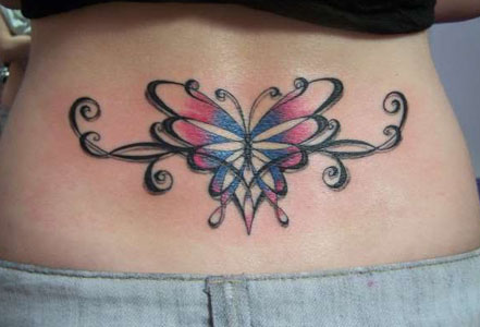 Lower back butterfly and tribal tattoo. Butterfly and tribal lower backpiece 