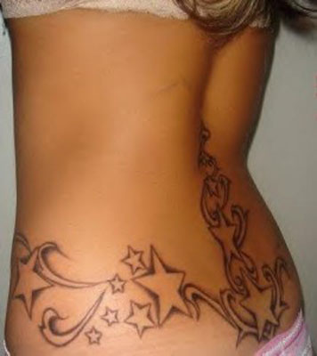 Lower Back Tattoos For Women. By Michelle Buee … Buee, Michelle “Lower Back 